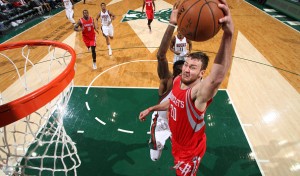 Milwaukee, WI - NOVEMBER 29: Donatas Motiejunas #20 of the Houston Rockets goes up for a dunk against the Milwaukee Bucks during the game on November 29, 2014 at the BMO Harris Bradley Center in Milwaukee, Wisconsin. NOTE TO USER: User expressly acknowledges and agrees that, by downloading and or using this Photograph, user is consenting to the terms and conditions of the Getty Images License Agreement. Mandatory Copyright Notice: Copyright 2014 NBAE (Photo by Gary Dineen/NBAE via Getty Images)
