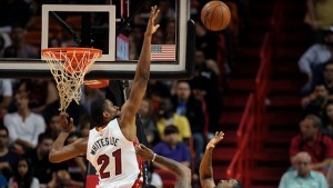 The Miami Heat's Hassan Whiteside (21) blocks the shot of the Orlando Magic's Ben Gordon during the first half at the AmericanAirlines Arena in Miami on Monday, Dec. 29, 2014. (Michael Laughlin/Sun Sentinel/TNS via Getty Images)