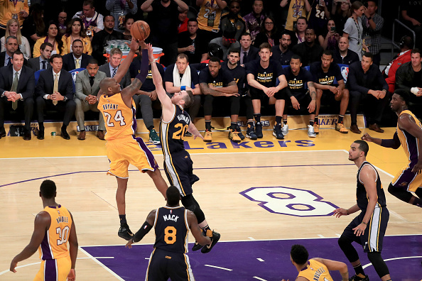 LOS ANGELES, CA - APRIL 13: Kobe Bryant #24 of the Los Angeles Lakers shoots over Gordon Hayward #20 of the Utah Jazz in the second half at Staples Center on April 13, 2016 in Los Angeles, California. NOTE TO USER: User expressly acknowledges and agrees that, by downloading and or using this photograph, User is consenting to the terms and conditions of the Getty Images License Agreement. (Photo by Sean M. Haffey/Getty Images)